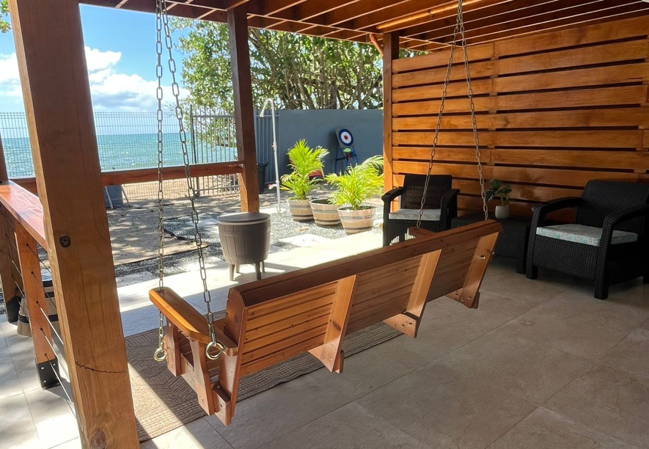 Apartamento en Mayaguez - Retiro Frente al Mar con Terraza, Playa y BBQ