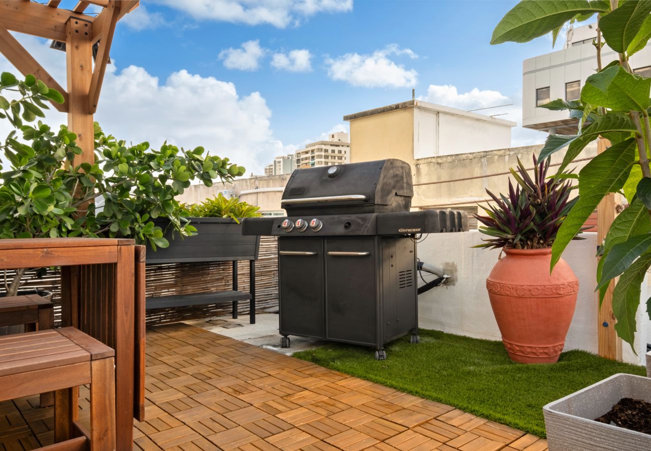 Apartment in Santurce - Prime Location at Condado with Rooftop Oasis