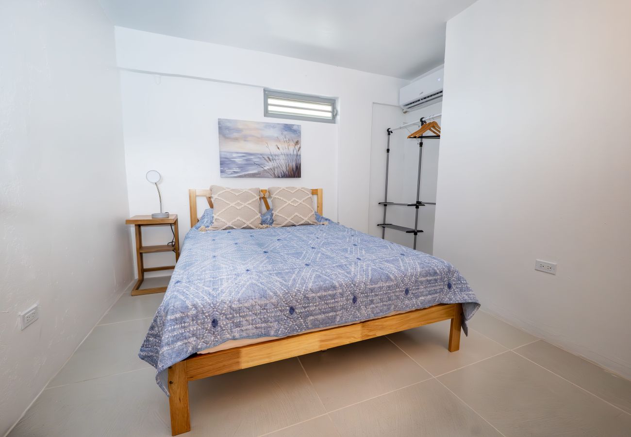 Apartment in Mayaguez - Oceanfront Retreat w/ Terrace, Direct access to Beach & BBQ