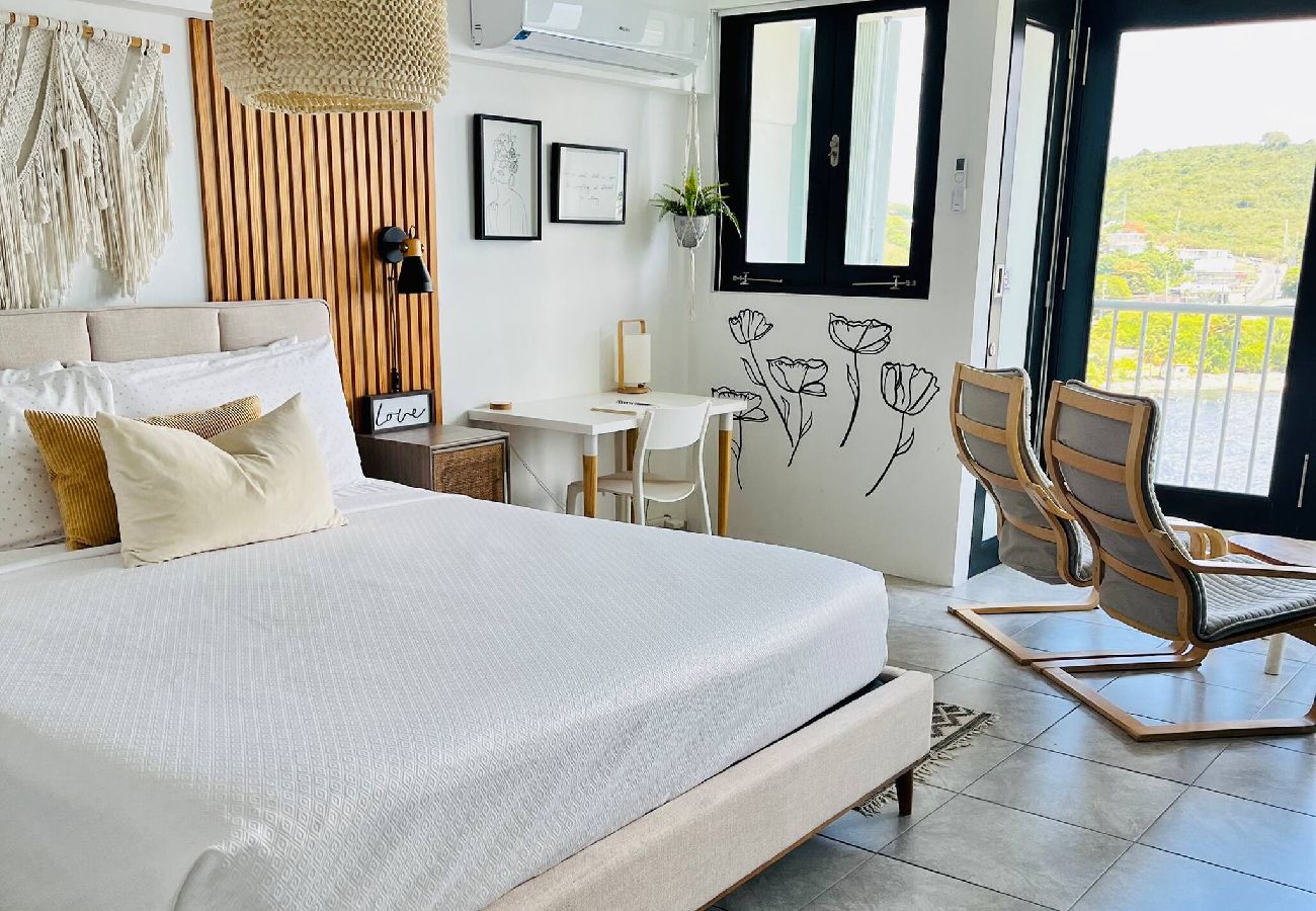 Condominium in Fajardo - Oceanfront Oasis: Panoramic Views & Marina Access 