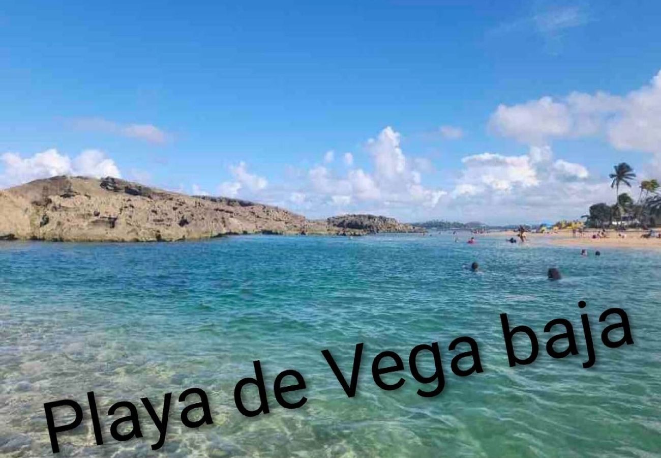 Apartment in Vega Baja - Comfortable 2BR Getaway for 6 Guests with Pool Access