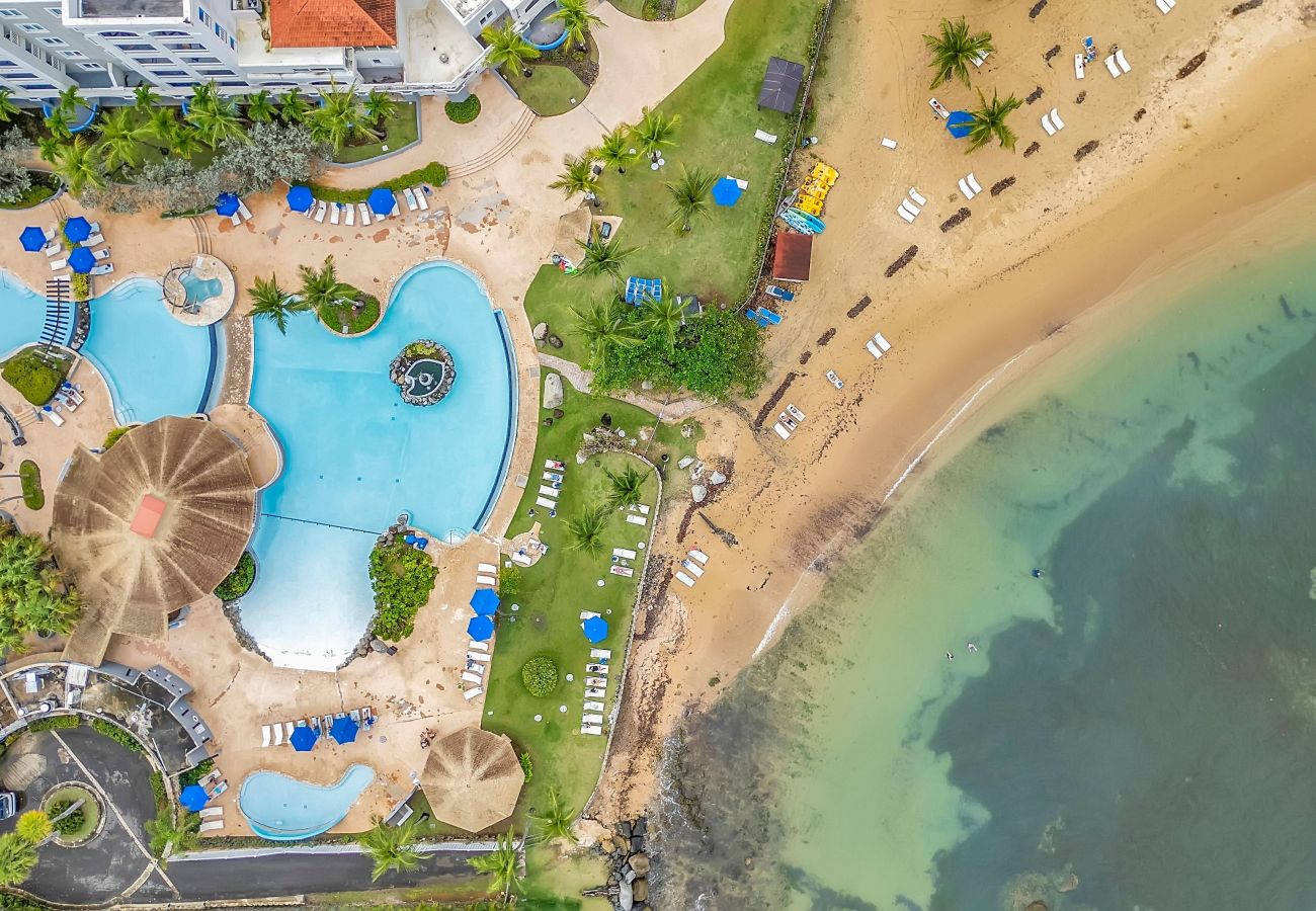 Apartment in Dorado - Modern Ocean Front View 2BR Retreat with Balcony